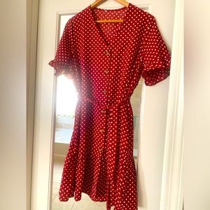Short sleeve polka dot dress with belt.